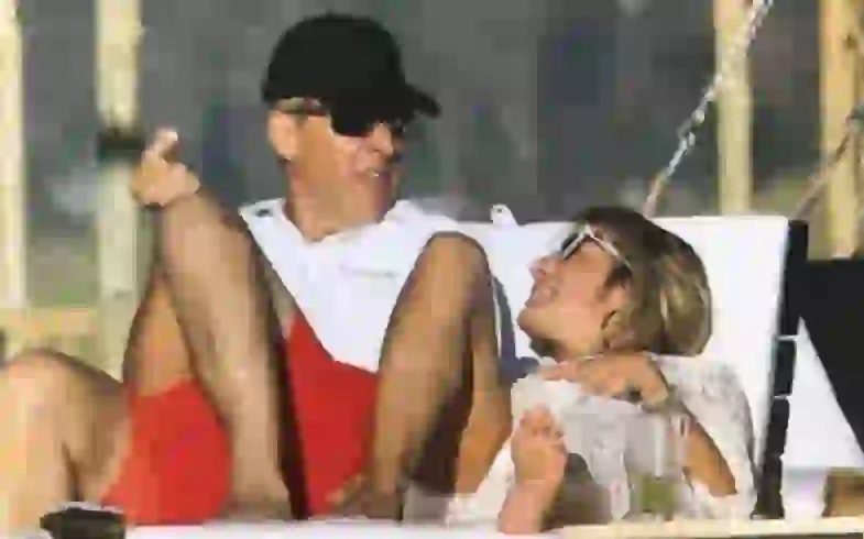 Redrado junto a su novia, la empresaria gastronómica